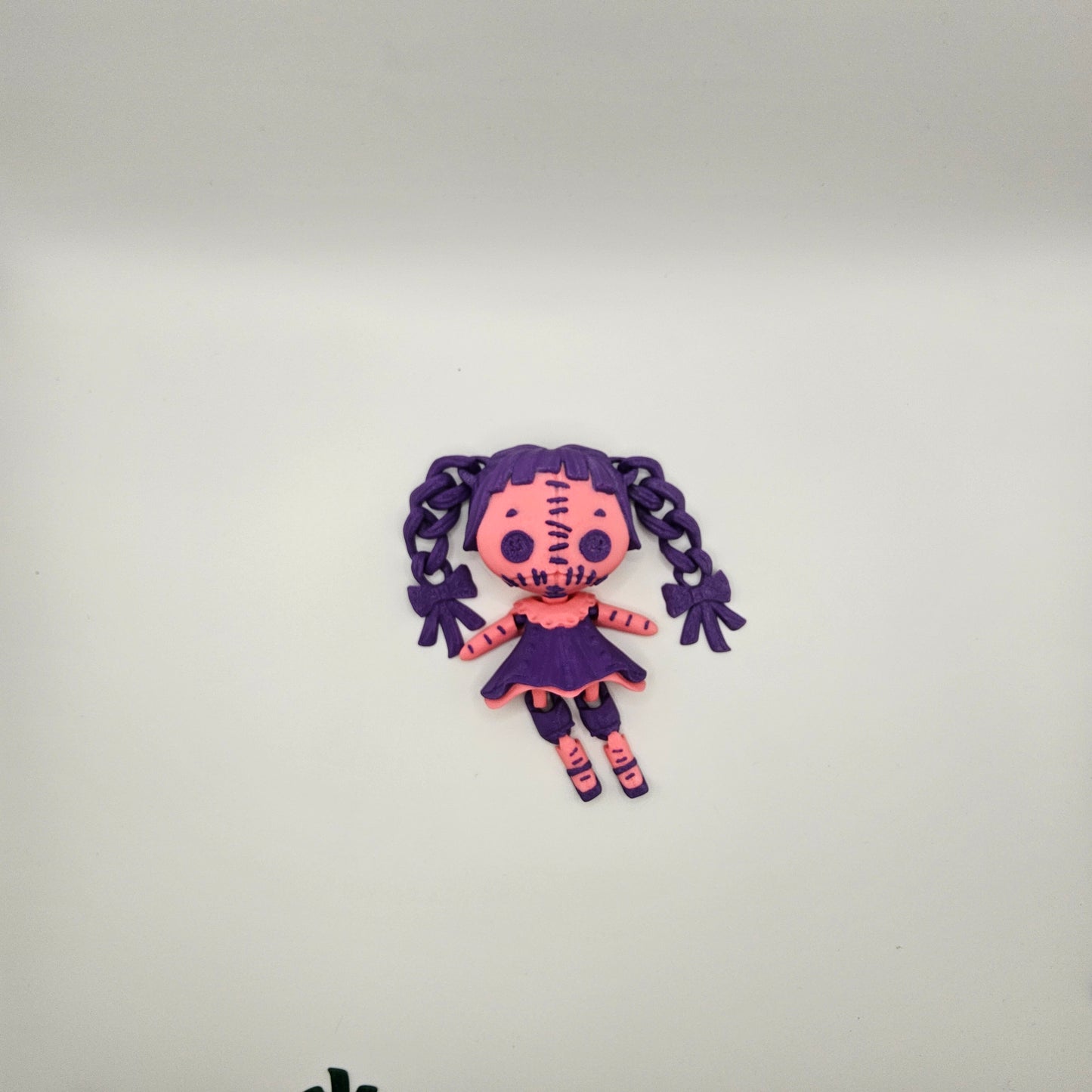 Two Coloured Creepy Doll